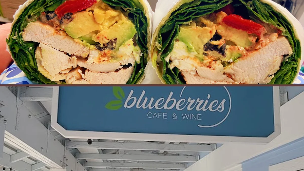 Colorful drinks and healthy lunch items on a table.