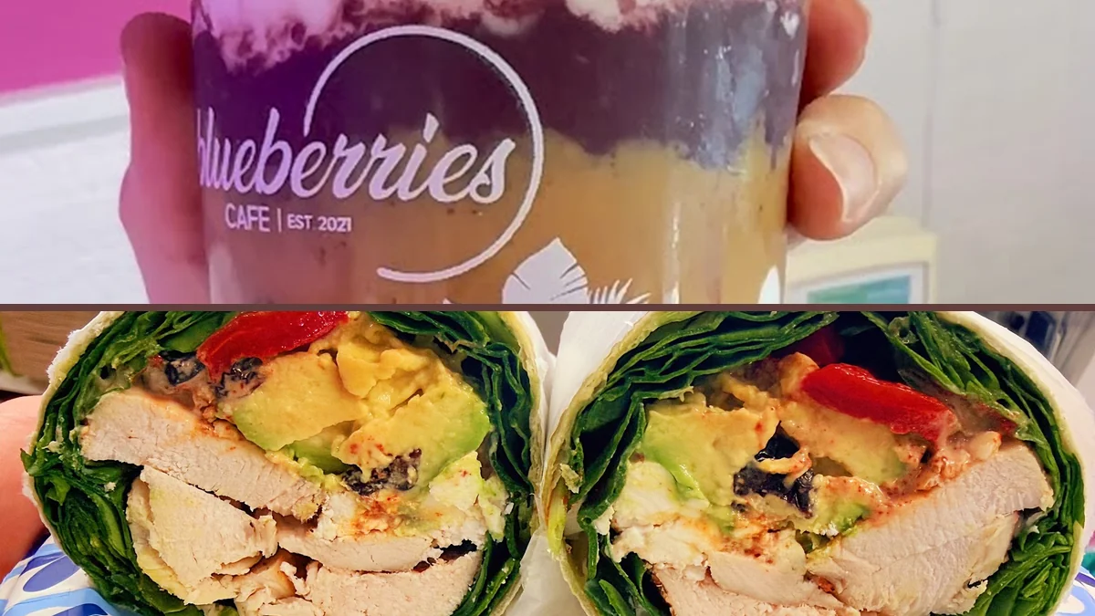 Colorful drinks and healthy lunch items on a table.